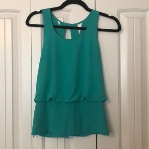 Strappy back green blouse